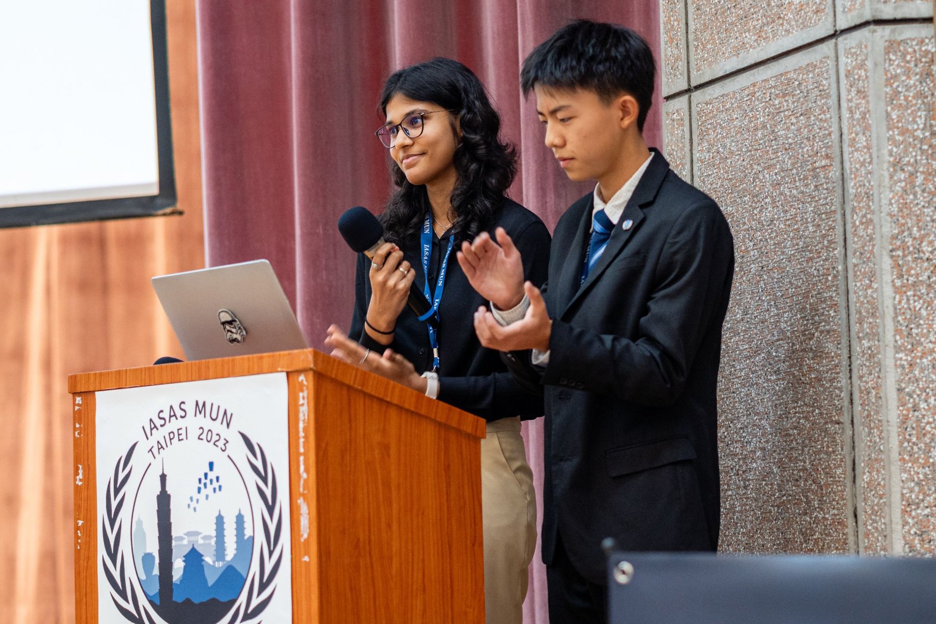 ISM delegates speaking at the IASAS MUN Taipei 2023 podium